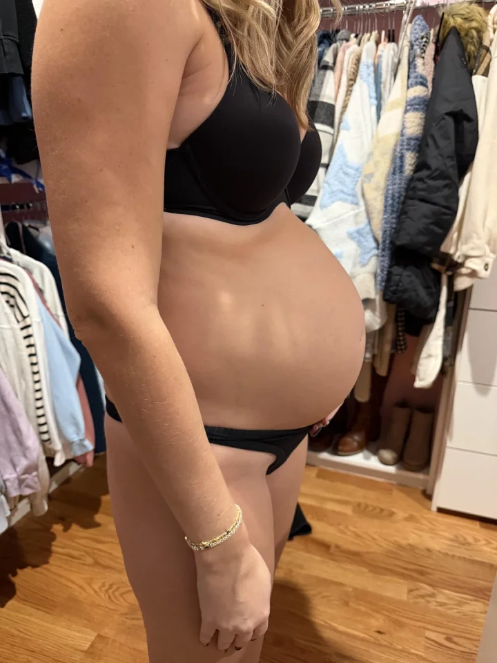 5 months pregnant. And yes, the neighborhood dads get to see everything underneath.