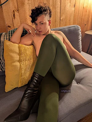 Wrapped in olive seduction and just enough attitude to ruin your focus
