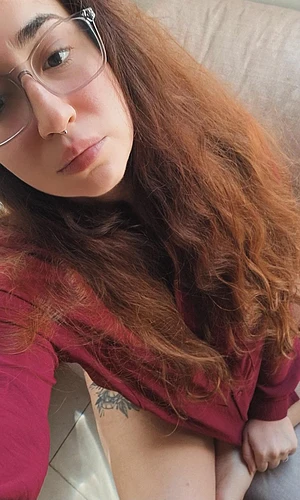 Is it the hair the lips or the glasses you're staring at?