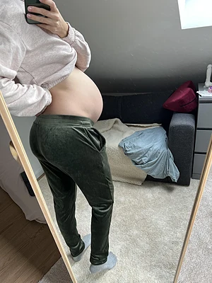 Since it’s getting colder: me in a sweater, but cropped to show the bump