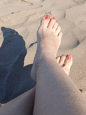 Should I remove the sand from my feet?
