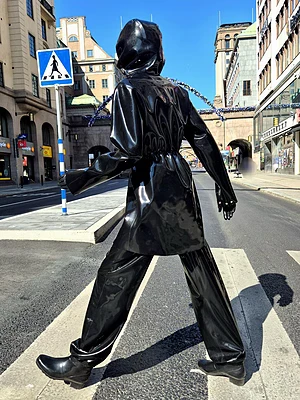 Outdoor rubber fetish fun?