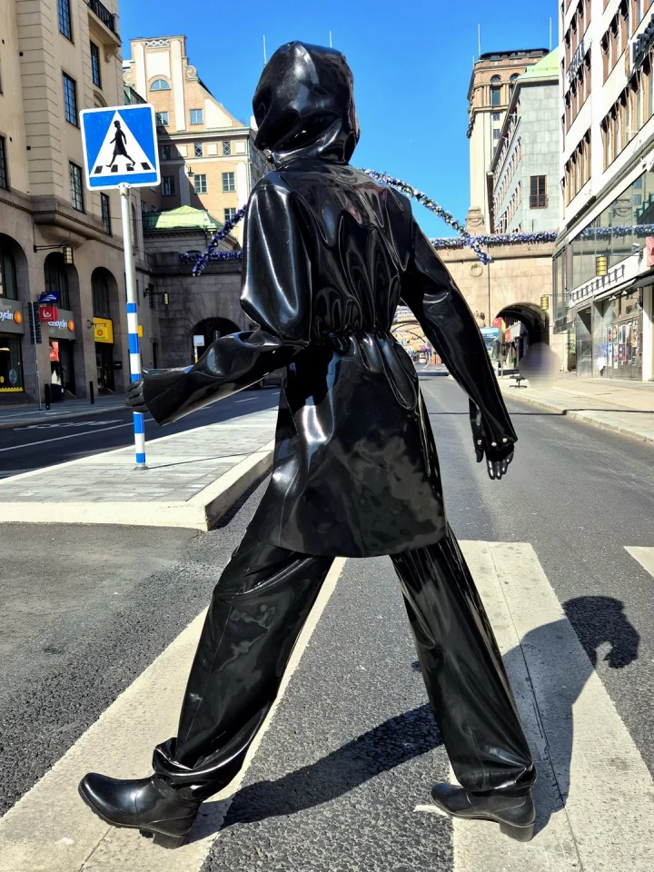 Outdoor rubber fetish fun?