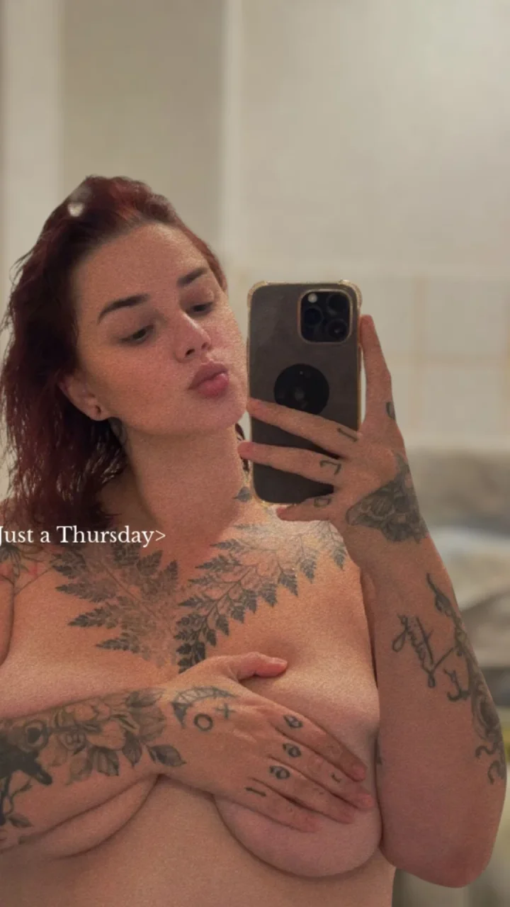 Hand on own chest picture of TattooedGoddess