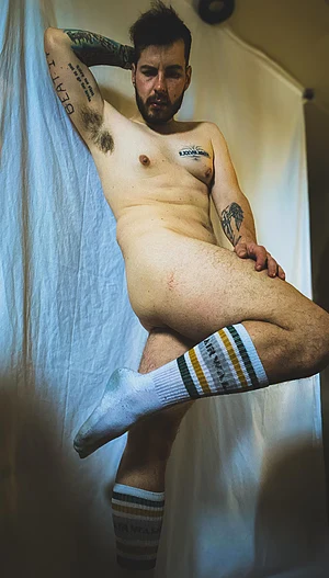 Tatted daddy teasing in my knee high socks 😘