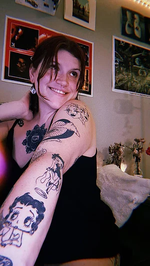 Curvy, tatted, and pierced