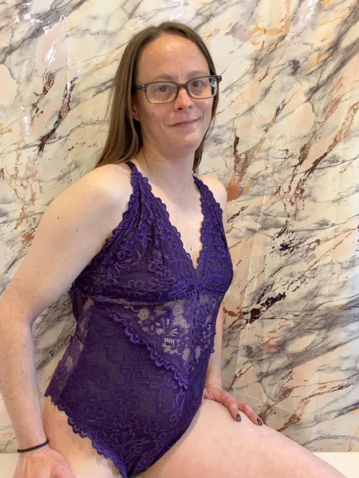 Black framed eyewear picture of Heather
