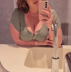 Your wife looks away & I lean over tempting you to touch me